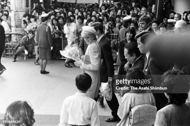 Prince Charles, Prince of Wales and Princess Diana, Princess of Wales are seen after visiting Kabukiza Theatre on May 12, 1986 in Tokyo, Japan.