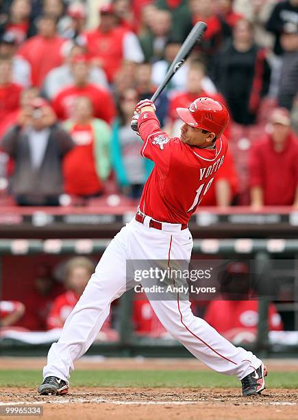 Joey Votto of the Cincinnati Reds hits the game winning hit in the bottom of the 9th inning during the game against the Milwaukee Brewers at Great...