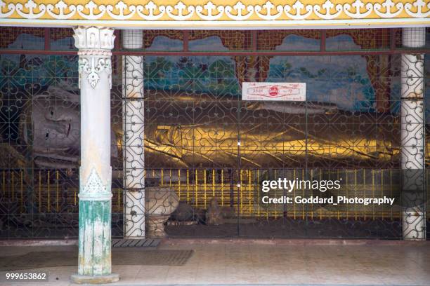 myanmar: shwezigon pagoda - reclining buddha statue stock pictures, royalty-free photos & images