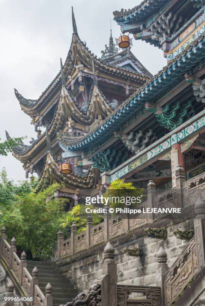 baolunsi temple low angle view in chongqing - chongqing municipality stock pictures, royalty-free photos & images