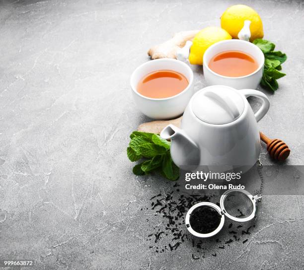 tea with lemon and mint - lemon mint stock pictures, royalty-free photos & images