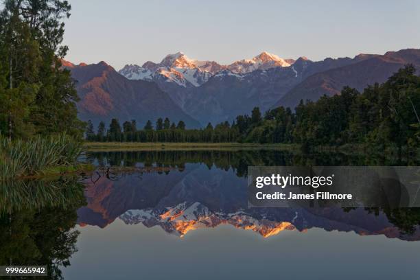 lake matheson mtcook - south westland stock-fotos und bilder