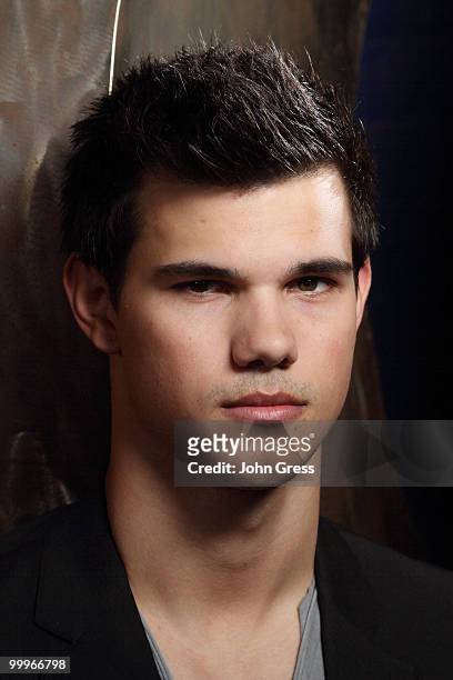 Actor Taylor Lautner poses for a private photo shoot at Marche on May 5, 2010 in Chicago, Illinois.
