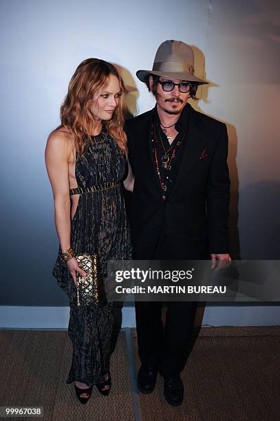 French actress Vanessa Paradis and her husband, US actor Johnny Depp arrive to attend the Figaro Madame/Chanel dinner during the 63rd Cannes Film...