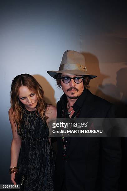 French actress Vanessa Paradis and her husband, US actor Johnny Depp arrive to attend the Figaro Madame/Chanel dinner during the 63rd Cannes Film...