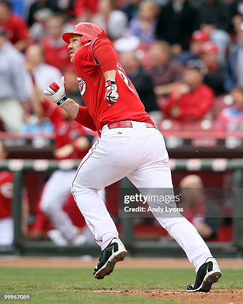Scott Rolen of the Cincinnati Reds hits a game tying two run home run in the bottom of the 9th inning during the game against the Milwaukee Brewers...