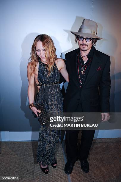 French actress Vanessa Paradis and her husband, US actor Johnny Depp arrive to attend the Figaro Madame/Chanel dinner during the 63rd Cannes Film...