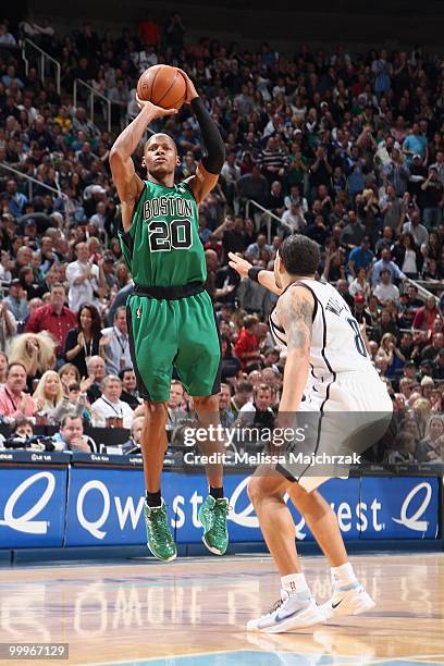 Ray Allen of the Boston Celtics takes a jump shot against Deron Williams of the Utah Jazz during the game at EnergySolutions Arena on March 22, 2010...