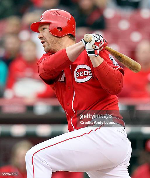 Scott Rolen of the Cincinnati Reds hits a game tying two run home run in the bottom of the 9th inning during the game against the Milwaukee Brewers...