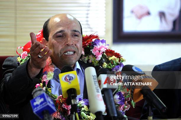 Iranian agent Ali Vakili Rad addresses journalists upon his arrival at Imam Khomeini Airport in Tehran, on May 18, 2010 after his release from a...