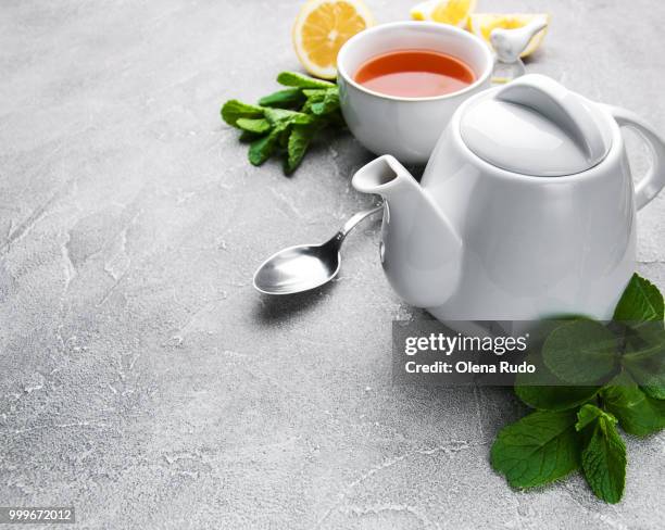 tea with lemon and mint - lemon mint stock pictures, royalty-free photos & images