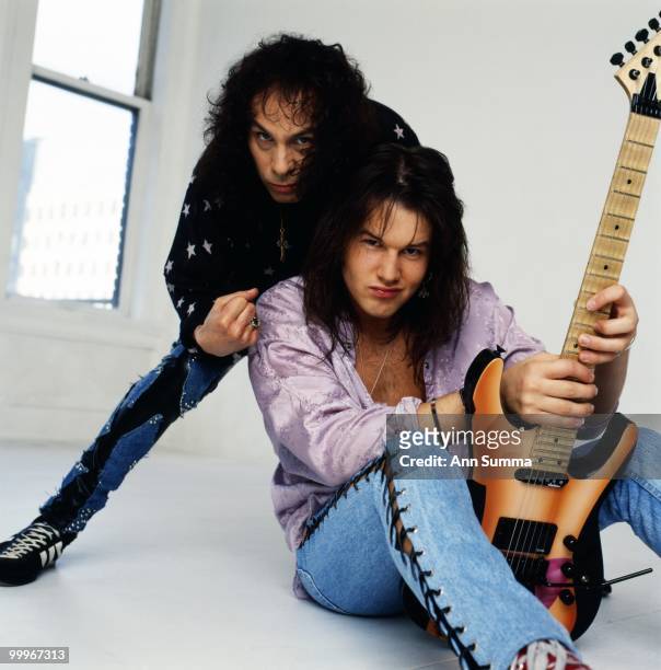 Singer Ronnie James Dio poses with guitarist Rowan Robertson on April 10, 1990. Robertson, a former fan, had just been signed with Dio.
