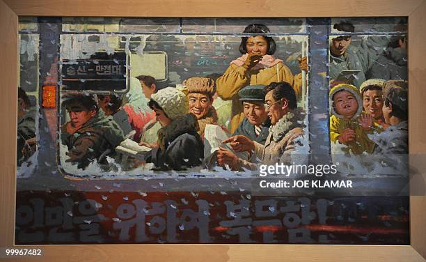 Painting featuring North Koreans in a bus is shown as part of the opening of the Democratic People's republic of North Korean state art exhibition...