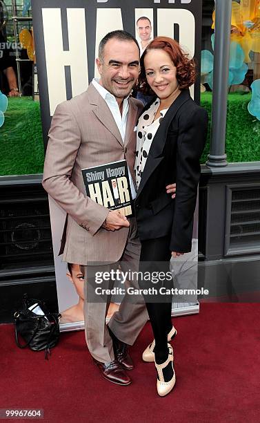 Andrew Barton and Sarah Cawood attend the book launch for Andrew Barton's 'Shiny Happy Hair' on May 18, 2010 in London, England.