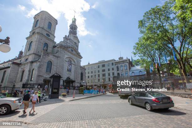 notre dame cathedral in historic old quebec city - old cathdral stock pictures, royalty-free photos & images
