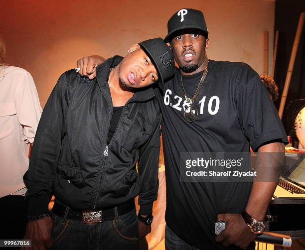 Red Cafe and Sean "Diddy" Combs attend Dirty Money's "Last Train to Paris" album listening party at Daddy's House on May 17, 2010 in New York City.