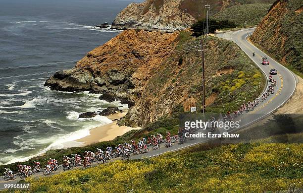 The peloton rides along the Pacific Coast during stage 3 of the Tour of California on May 18, 2010 in Montara, California on their way to the finish...