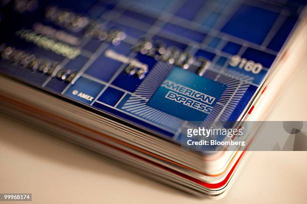 An American Express credit card is displayed for a photograph in New York, U.S., on Tuesday, May 18, 2010. Credit-card firms caught off-guard by U.S....