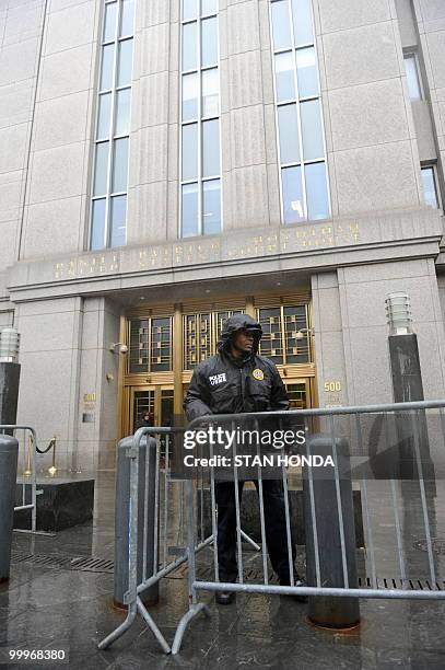 Court Marshall stands guard outside Federal Court in New York as Faizal Shahzad, the suspect in the attempt to set off a bomb in Times Square, makes...