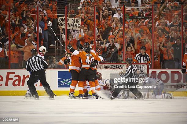 Philadelphia Flyers Braydon Coburn victorious, after scoring goal vs Montreal Canadiens goalie Jaroslav Halak . Game 1. Philadelphia, PA 5/16/2010...