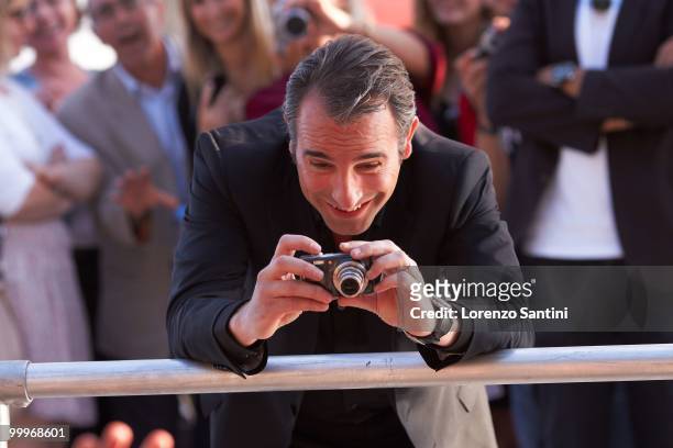 Jean Dujardin attends "Le Grand Journal" Show on Canal Plus at the Majestic Beach of Cannes on May 18, 2010 in Cannes, France.