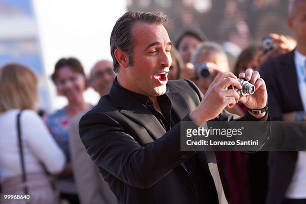 Jean Dujardin attends "Le Grand Journal" Show on Canal Plus at the Majestic Beach of Cannes on May 18, 2010 in Cannes, France.