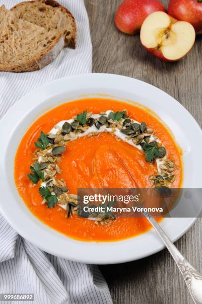 pumpkin-apple soup puree - apple puree stock pictures, royalty-free photos & images
