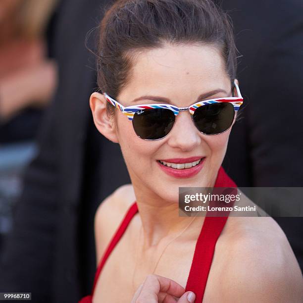 Marion Cotillard attends "Le Grand Journal" Show on Canal Plus at the Majestic Beach of Cannes on May 18, 2010 in Cannes, France.