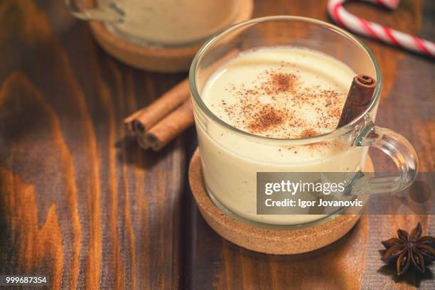 eggnog with cinnamon - eggnog stock pictures, royalty-free photos & images