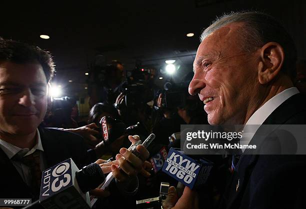 Sen. Arlen Specter talks with reporters while touring the site of his primary night gathering for staff and supporters May 18, 2010 in Philadelphia,...