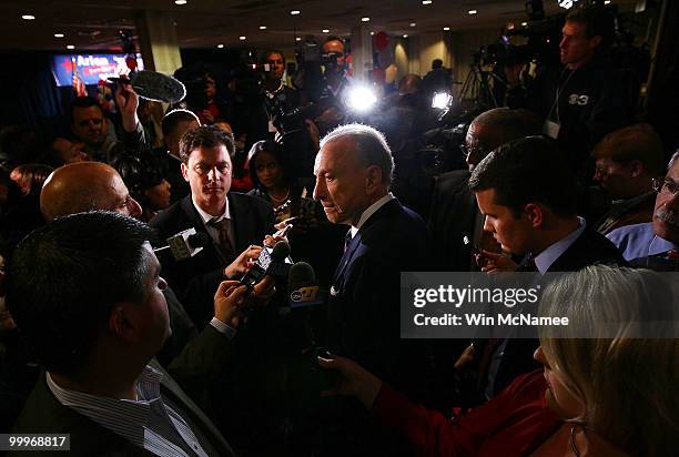 Sen. Arlen Specter talks with reporters while touring the site of his primary night gathering for staff and supporters May 18, 2010 in Philadelphia,...