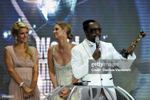 Paris Hilton, Nicky Hilton and will.i.am of the Black Eyed Peas speak onstage during the World Music Awards 2010 at the Sporting Club on May 18, 2010...