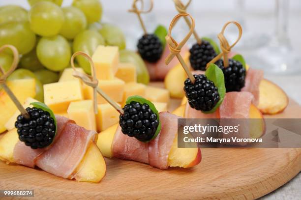 canape of peach with jamon - jamon stockfoto's en -beelden