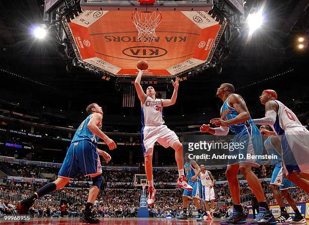 Chris Kaman of the Los Angeles Clippers puts a shot up against the New Orleans Hornets during the game at Staples Center on March 15, 2010 in Los...
