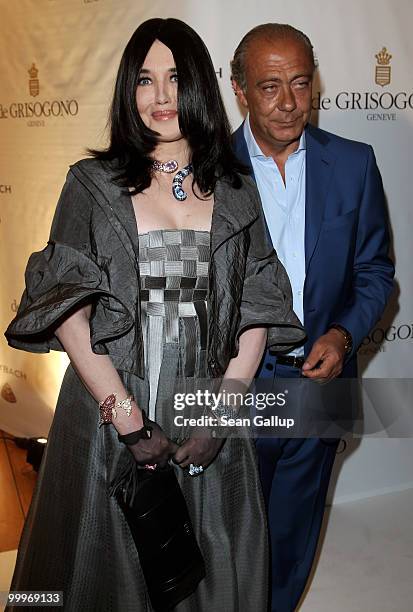 Actress Isabelle Adjani and Fawaz Gruosi attend the de Grisogono party at the Hotel Du Cap on May 18, 2010 in Cap D'Antibes, France.