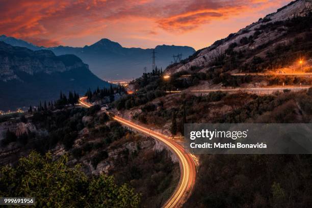 the road of fire. - matita stock pictures, royalty-free photos & images