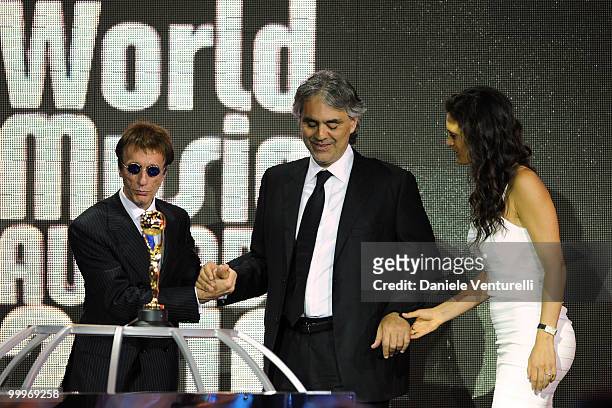 Robin Gibb, singer Andrea Bocelli and wife Veronica Berti onstage during the World Music Awards 2010 at the Sporting Club on May 18, 2010 in Monte...
