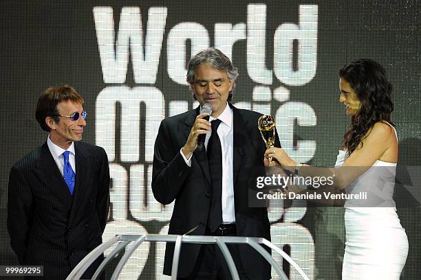 Robin Gibb, Andrea Boccelli and Veronica Berti speak on stage during the World Music Awards 2010 at the Sporting Club on May 18, 2010 in Monte Carlo,...