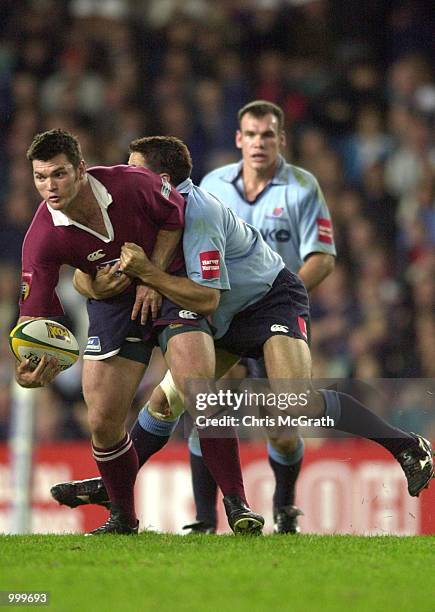 Daniel Herbert of the Reds looks for support during the Super 12 match between the Queensland Reds and the NSW Warratahs held at the Sydney Football...