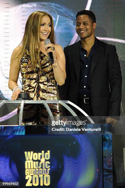Singer/actress Jennifer Lopez and actor Cuba Gooding Jr. Speak on stage during the World Music Awards 2010 at the Sporting Club on May 18, 2010 in...