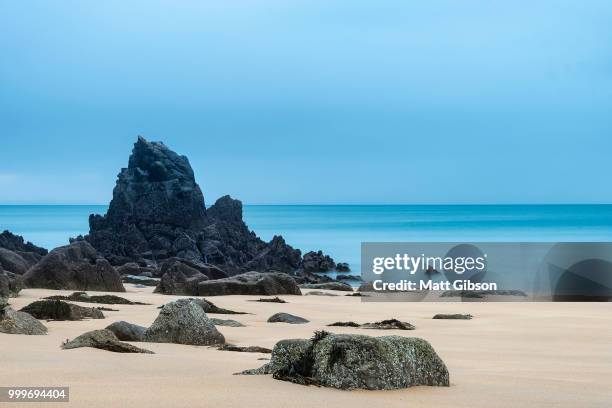 stunning, vibrant sunrise landscape image of barafundle bay on p - dyfed stock pictures, royalty-free photos & images