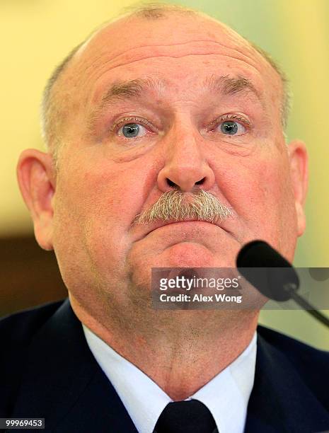 Coast Guard Commandant Admiral Thad Allen listens during a hearing before the Senate Commerce, Science, and Transportation Committee May 18, 2010 on...