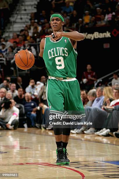 Rajon Rondo of the Boston Celtics brings the ball up court against the Cleveland Cavaliers in Game Five of the Eastern Conference Semifinals during...