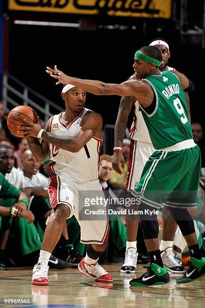 Daniel Gibson of the Cleveland Cavaliers looks to pass around Rajon Rondo of the Boston Celtics in Game Five of the Eastern Conference Semifinals...