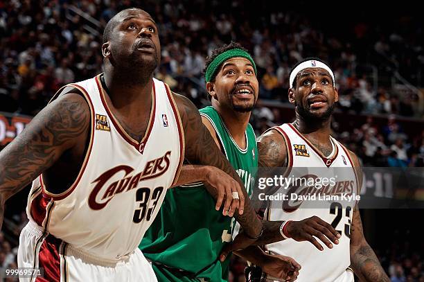 Shaquille O'Neal and LeBron James of the Cleveland Cavaliers box out Rasheed Wallace of the Boston Celtics in Game Five of the Eastern Conference...