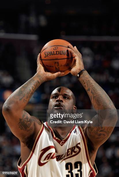 Shaquille O'Neal of the Cleveland Cavaliers shoots a free throw against the Boston Celtics in Game Five of the Eastern Conference Semifinals during...