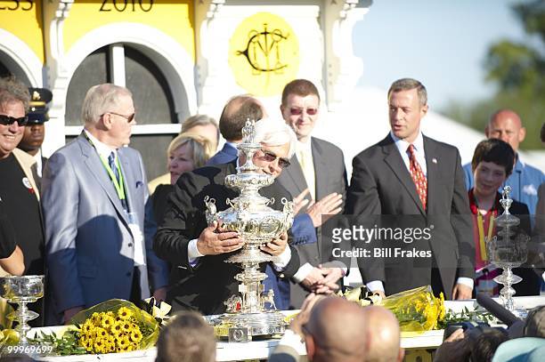 Preakness Stakes: Lookin at Lucky trainer Bob Baffert victorious with Woodlawn Vase trophy after winning 135th Running at Pimlico Race Course....