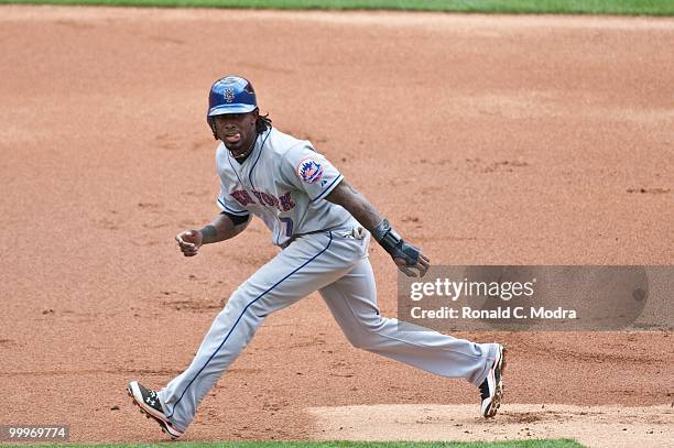 Jose Reyes of the New York Mets runs to third base during a MLB game against the Florida Marlins in Sun Life Stadium on May 16, 2010 in Miami,...