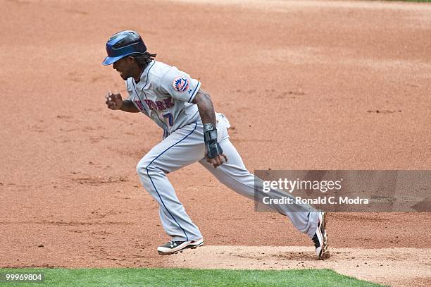 Jose Reyes of the New York Mets runs to third base during a MLB game against the Florida Marlins in Sun Life Stadium on May 16, 2010 in Miami,...