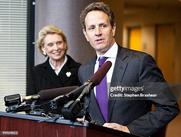 Treasury Secretary Timothy Geithner speaks during a news conference after a tour of the Port of Tacoma May 18, 2010 in Tacoma, Washington. At left is...